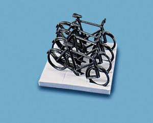 Peco Modelscene 5055 Cycles & Stand (Pack contains 4 unpainted cycles) - OO / HO Scale